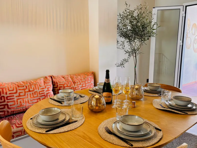 Dining table set for dinner