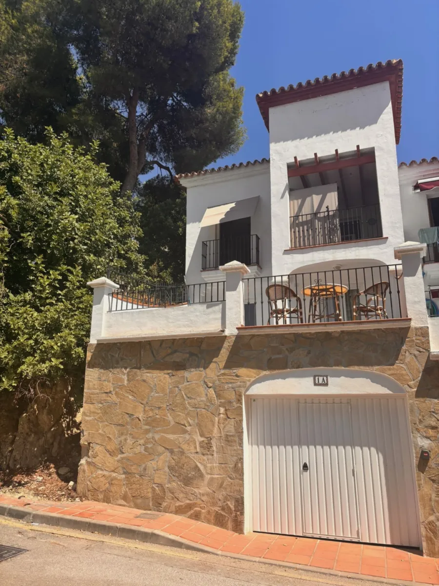 Front of the house with the garage below