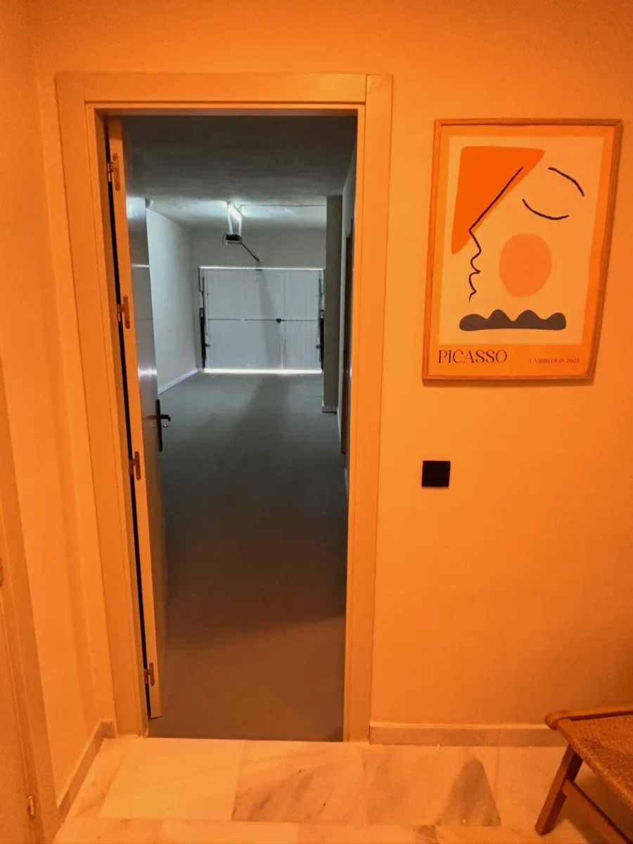 Hallway with a Picasso print