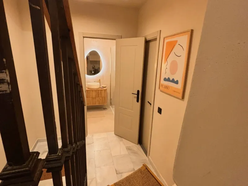 Hallway with a woven chair