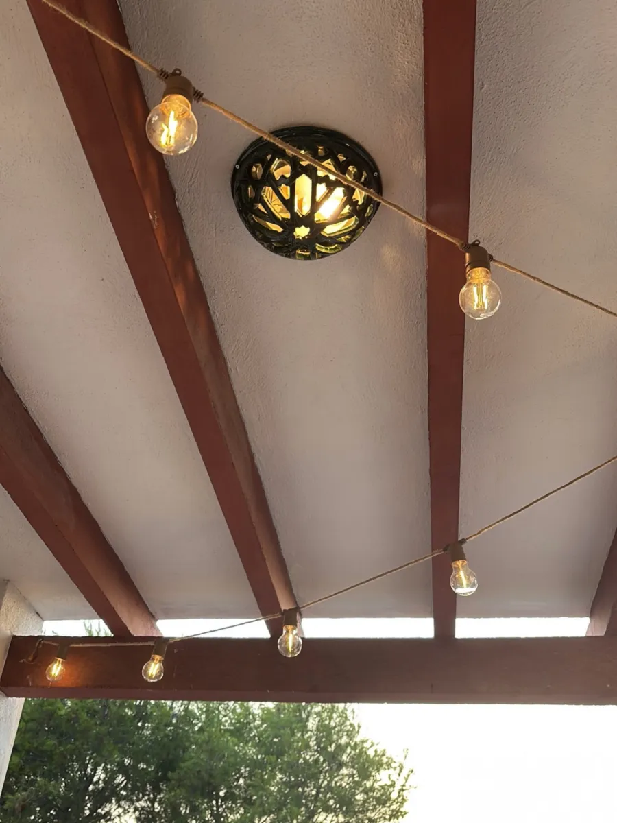 Pergola with string lights over the terrace