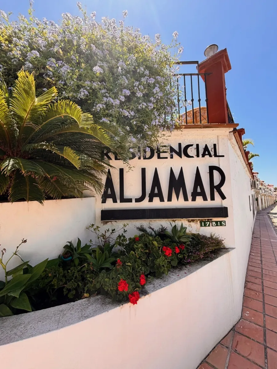Entrance sign of Residencial Aljamar in Nerja