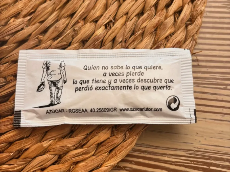 Sugar sachet on a rattan placemat