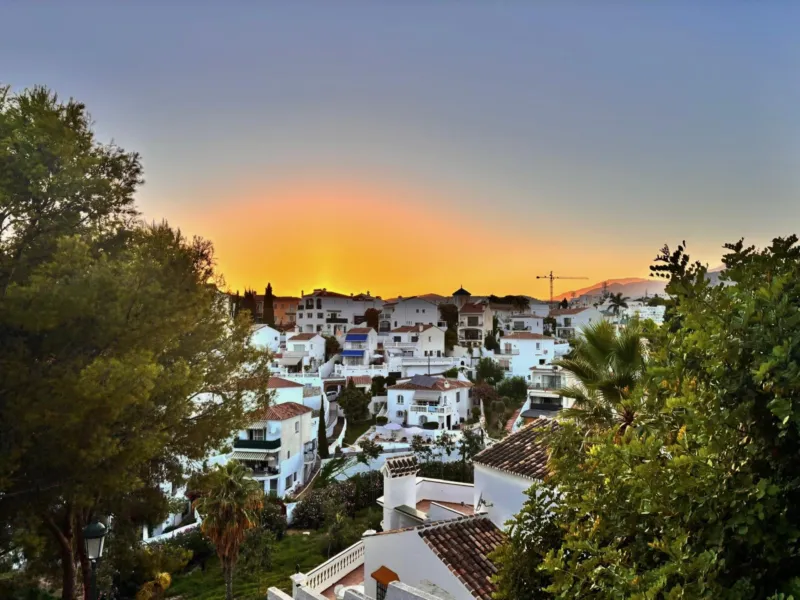 Sunset over the white houses of Nerja