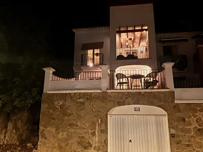 The house at night from the street