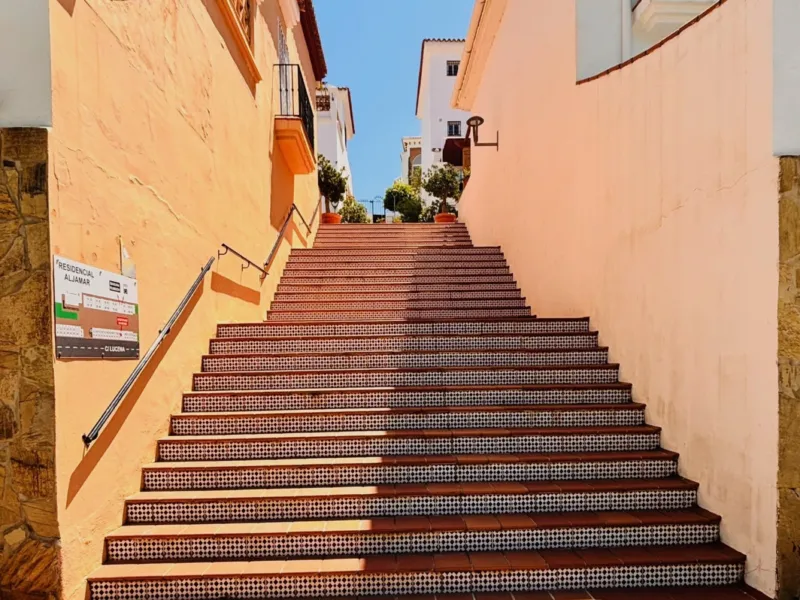 Wide tiled stairs in the sun